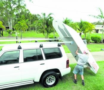 The ultra light weight of infused glass craft makes them ideal for car top travel. How many craft of this size are so easily loaded by one person!