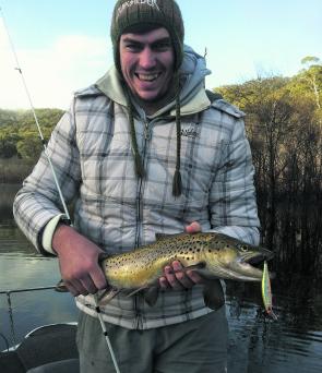Jake Steiger with a typical Eildon brown trout.
