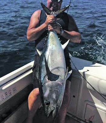 Baz Gorman with a magnificent tuna from out the front of the peninsula.