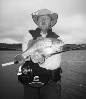 Warrick Hamer caught this 1.2kg Bullen Merri bass on a single tail soft plastic despite the overcast weather.