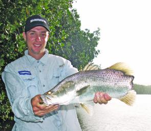 Amazing! A barramundi that had its tail bitten off by a shark earlier in its life has survived well and continues to live and feed!