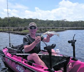Casey with a whiting caught on a Castaway estuary charter.