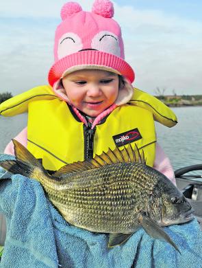 Zoe Hodges admires another lure caught pre-spawn local bream. 