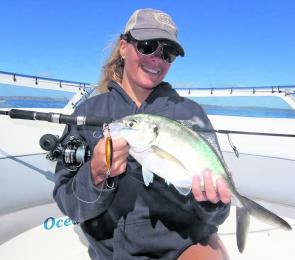 Kath Levett with a micro-jigged silver trevally.