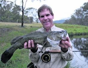 This cod, while by no means a large one, hit particularly hard and put up a solid fight on a stormy afternoon