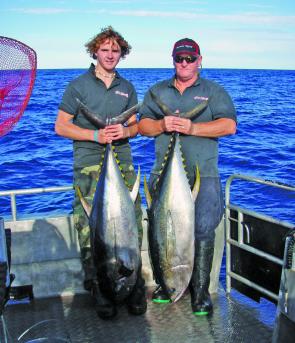 They’re on: Jason and dad Andy Legge with a pair of 30kg yellowfin.