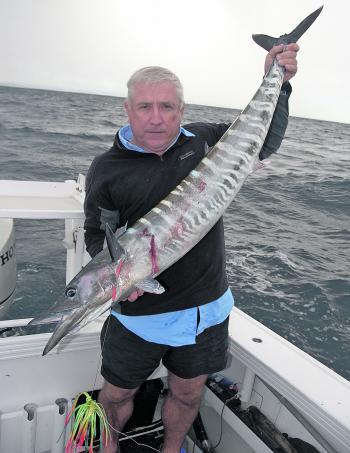Mark Frendin with a wahoo on a Hexhead.