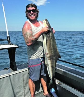Luke Coe with a cracker cobia caught on Nine-Mile Reef.