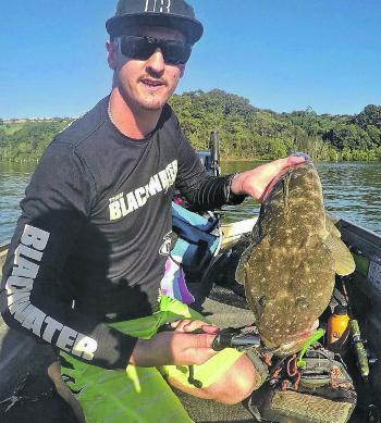 Adrian Butler with a big flathead caught in Terronora.