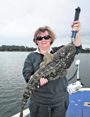 Croc-sized flatties can be expected this month. Jenny Horsburgh with an 85cm fish just prior to release.