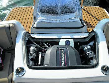 There’s 200HP of Volvo Penta power under the lid – the white bottle centre-middle is the water-free flushing solvent reservoir.
