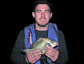 Hayden Gillon with an average size bay bream caught floating a peeled prawn near some structure.