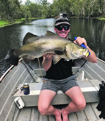Mitch Innocend with a 83cm lagoon barra taken on a Rapala twitching mullet.