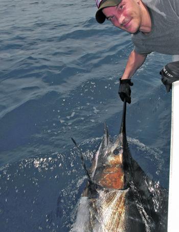 Chad having a good time showing this marlin the sky.