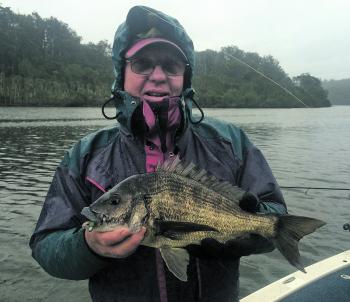 A bruising 1.6kg black bream caught and released when the weather was less than perfect.