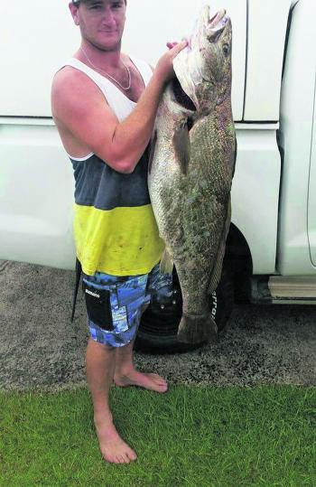 Kim Rickter with a 22kg mulloway that he caught on a Sunami Paddle-Tail sot plastic. 