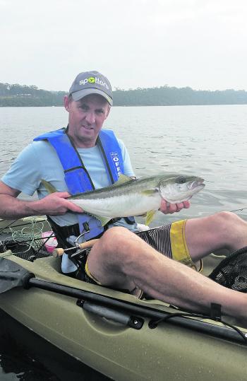 Brendan Roworth lands a 67cm Gippsland Lakes kingfish. (Photo courtesy of Justin Dingwall)