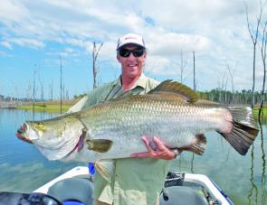 Steve Stewart with a 122cm barra. Storm Bait and Twitch lures have been consistently nailing big barra like this in Monduran.