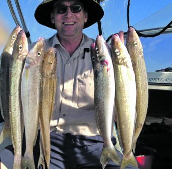 Chris Rosenbrock with a handful of big Middle Spit whiting.