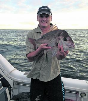 Jeff Stenhouse with the typical sort of snapper that should show up this month over reefs off the Hunter Coast. Fish like this will take fish flesh, prawns, squid, octopus or lures.