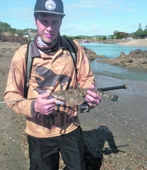 Josh with a flathead picked up on a Mask Vib.