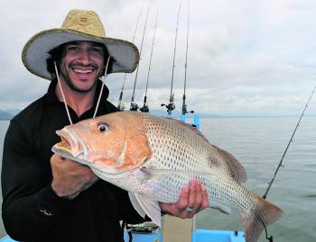 This is one swell golden snapper for JT, caught just before the water quality dropped in the channel.