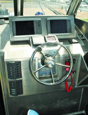 All electronics, switches and gauges are flush mounted and come easily to hand.
