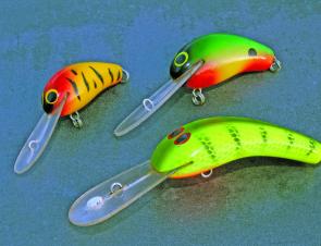 Some very early Oar-Gee Lures. The Pee Wee and Wee Pee are wooden but the 75mm Plow is a later polyurethane version. 