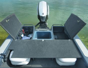 At rest, the rear deck doubles in size with a flip-over section that covers the seats. The rear underfloor storage is divided by a decent livewell.