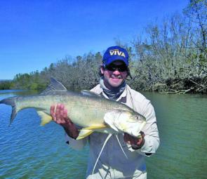 Karim with a big threadfin salmon caught on a soft plastic during the cooler period.