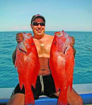 Jason Teelow holding these two large-mouth nannygai is an indication as to how good the reef fishing has been this year.