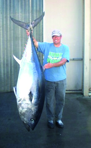 Shane Cromie has broken the existing Victorian SBT record by 1kg with this 126kg tuna.