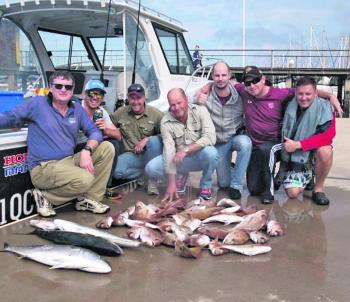 Happy anglers with their bag of squire and a couple of solid kingies