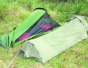 You will greatly benefit from a fly over any camping area, especially a quick set up sleeping arrangement like this one.