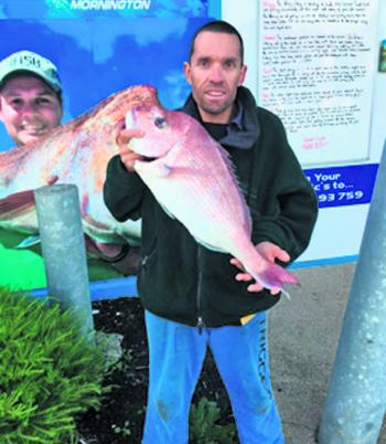 Mornington Pier regular Darren Matthews with a 3.5kg red weighed in at Mornington recently. The wet and rough weather has provided some excellent but uncomfortable land-based snapper fishing from Mornington Pier and the surrounding rock platforms.