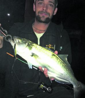 Ben with a healthy tailor caught at night on the Pine River. 