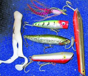 A selection of all the different types of surface lures. From top, Garside Gurgler, cupfaced popper, Tango Dancer and Mr Poppas Blooper; to the left a Z-Mans Frogz; and to the right a Mr Poppas Pencil popper.