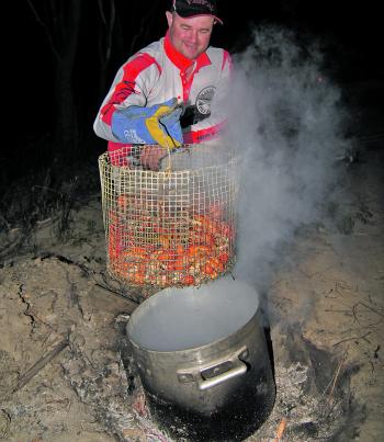 Gareth Lynch admires good haul of cooked yabbies from the Murray River.