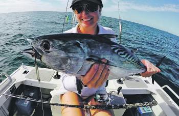 Caloundra Fishing World owner Lauren Marsh with one of many mac tuna caught off Caloundra in May.