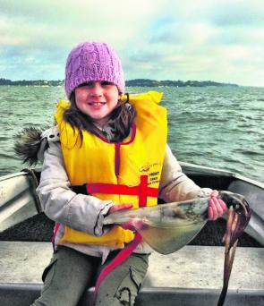 Lilly Bell with a lovely breeder calamari. The next month will see plenty more like this one, caught.