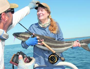 Setting up a photo of Denise’s cobia. Fish like these are great sport on a 9wt fly rod. 
