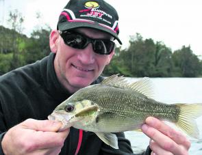 Jason Dragos with a nice Bass taken on a Jackal Chubby slow rolled along a lily bed.