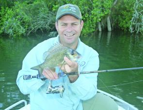 This lovely bream was hiding between the two mangrove trunks in the background and an accurate cast was rewarded with a nice fish.