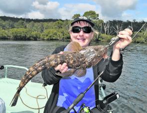 Ruth Spencer with a colourful Bermagui flathead taken on a soft plastic prawn imitation.