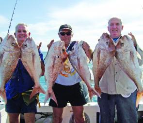 Ron Feeney and his crew from the Sunshine Coast with their bag limit of quality Snapper.