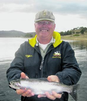 Nick Elliott from Jindabyne with a perfect meal sized lake rainbow.