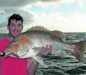 David Mayes caught this monster golden snapper luring off Cairns during the wet.
