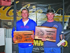 The 2012 Alsta Angling Hobie Bream Classic champions Team Colac Tackle display their champion trophies to the crowd.