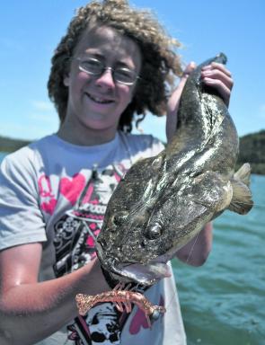 This young man had never caught a flathead before, let alone on a lure. Happy? You bet!