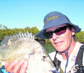 Dave with his PB bream, a solid fish measuring 33cm.